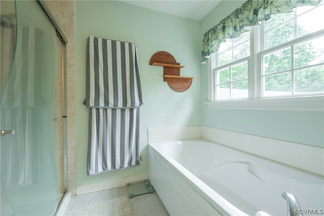 3530 Timberview Road Powhatan, VA 23139 - Photo 24 of 50 a bathroom with a bathtub and window