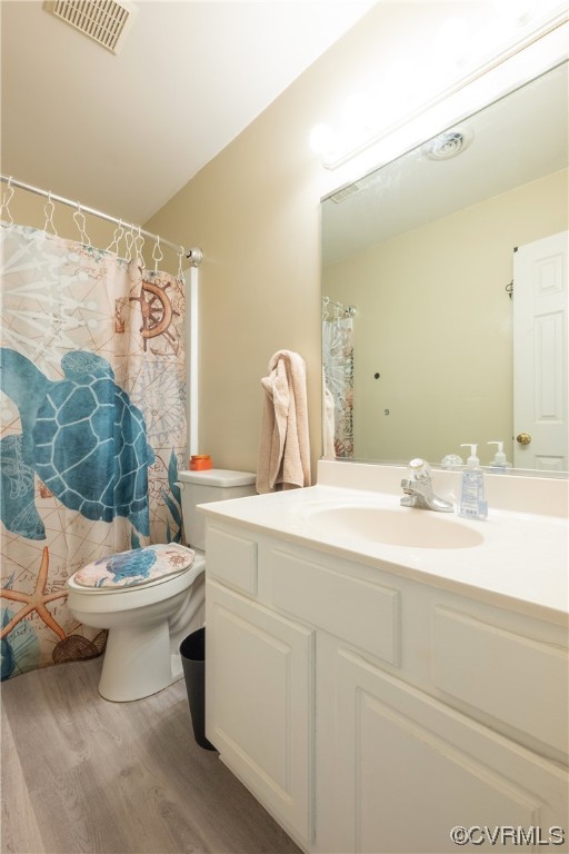 3530 Timberview Road Powhatan, VA 23139 - Photo 27 of 50 a bathroom with a toilet sink and mirror