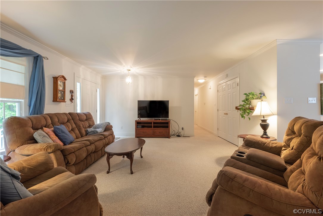 3530 Timberview Road Powhatan, VA 23139 - Photo 31 of 50 a living room with furniture and a flat screen tv