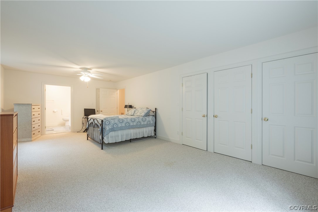 3530 Timberview Road Powhatan, VA 23139 - Photo 35 of 50 a living room with furniture and a chandelier