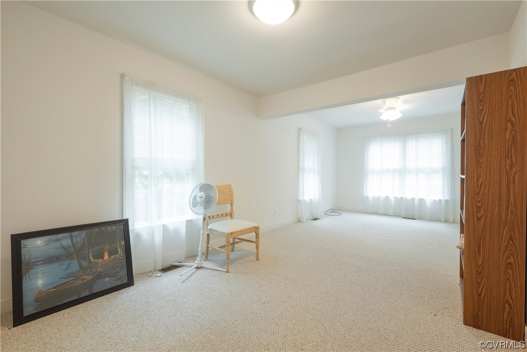 3530 Timberview Road Powhatan, VA 23139 - Photo 38 of 50 a view of an empty room with a fireplace and a window