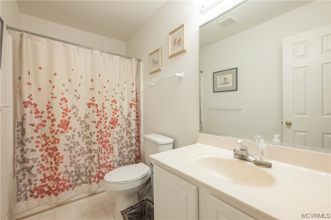 3530 Timberview Road Powhatan, VA 23139 - Photo 40 of 50 a bathroom with a sink toilet and shower