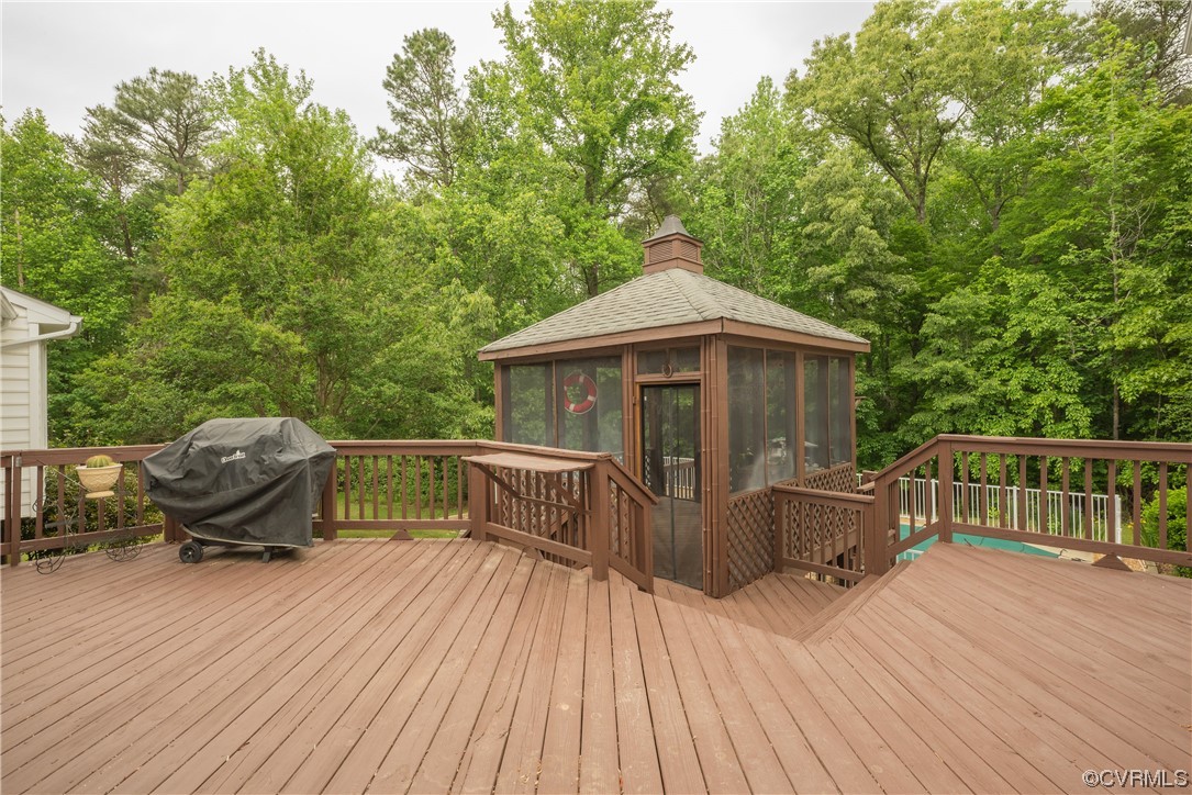 3530 Timberview Road Powhatan, VA 23139 - Photo 45 of 50 a view of house with deck outdoor seating and yard in the back