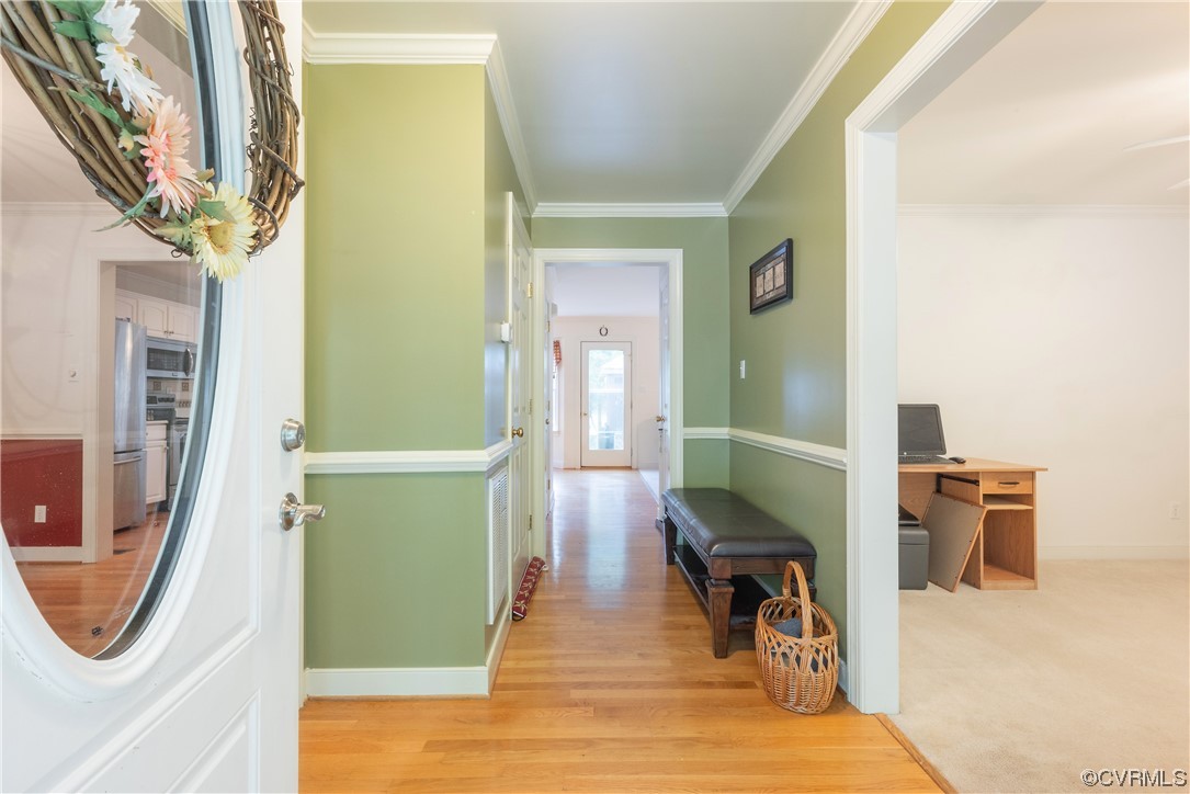 3530 Timberview Road Powhatan, VA 23139 - Photo 7 of 50 a view of a hallway with wooden floor and staircase