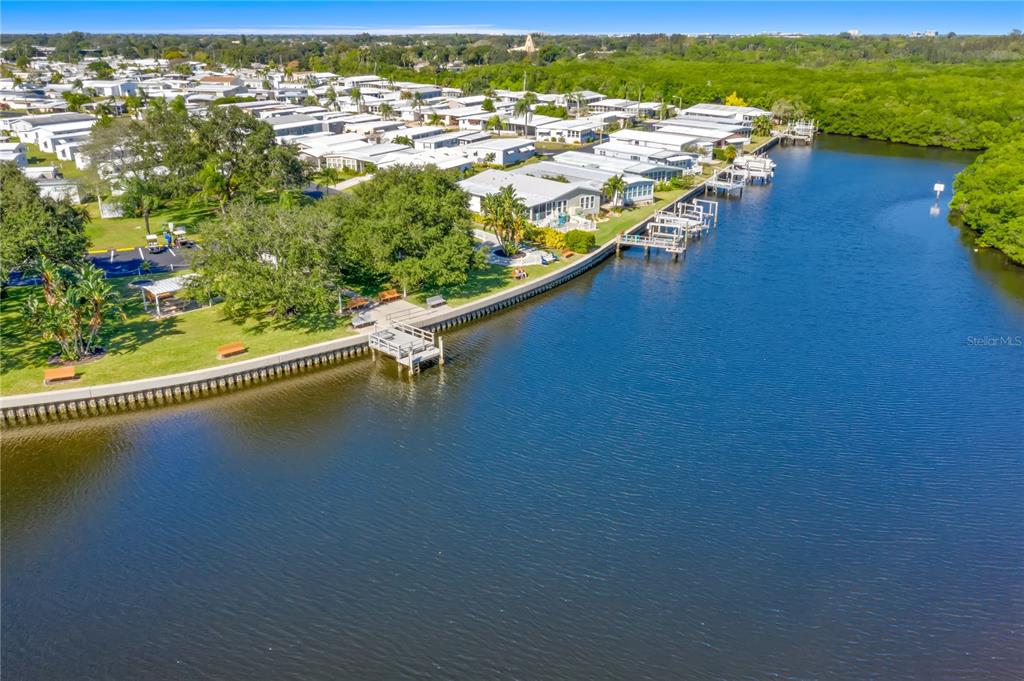 7254 Mt Fairfield Road Northeast, Unit 531 St. Petersburg, FL 33702 - Photo 18 of 19 view of a lake with houses