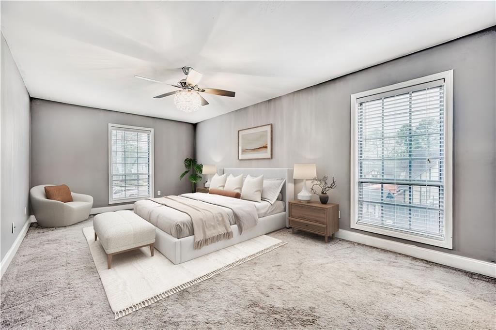 6851 Roswell Road, Unit A5 Atlanta, GA 30328 - Photo 12 of 35 a bedroom with bed and window