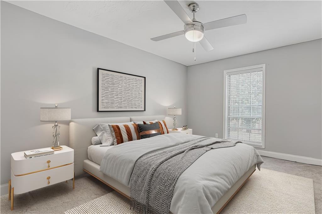 6851 Roswell Road, Unit A5 Atlanta, GA 30328 - Photo 16 of 35 a bedroom with bed and window
