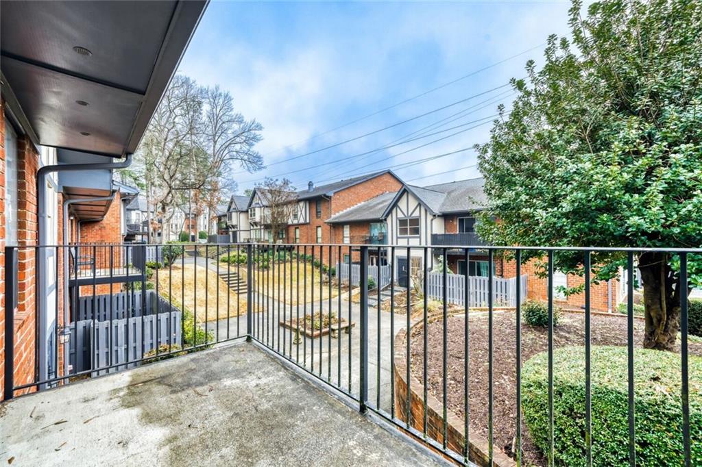 6851 Roswell Road, Unit A5 Atlanta, GA 30328 - Photo 22 of 35 a view of a houses from balcony