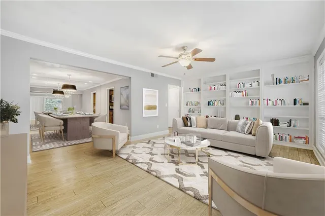 a living room with furniture and a table