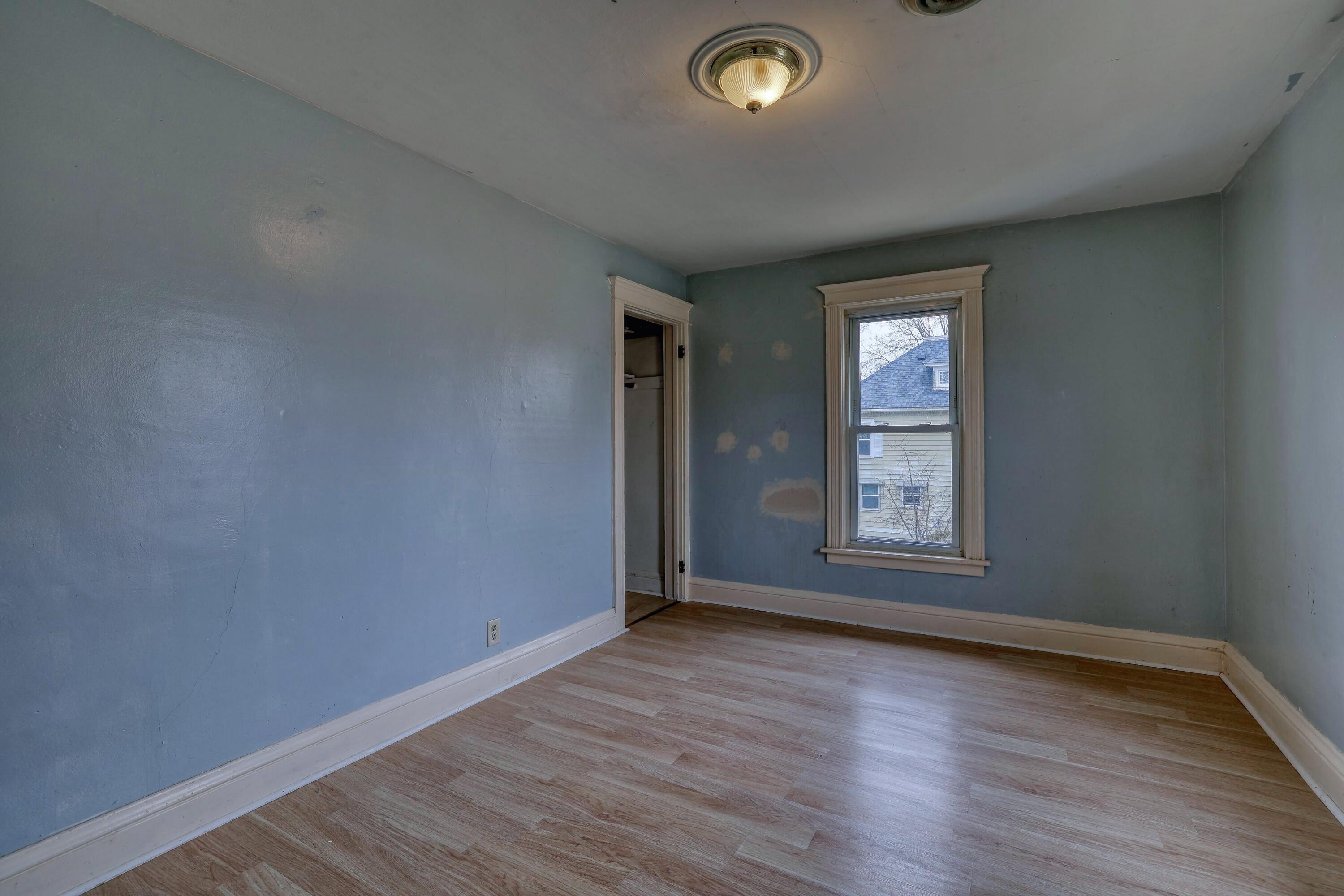 301 Pleasant Street, Unit 303 Mukwonago, WI 53149 - Photo 12 of 24 Upper bedroom