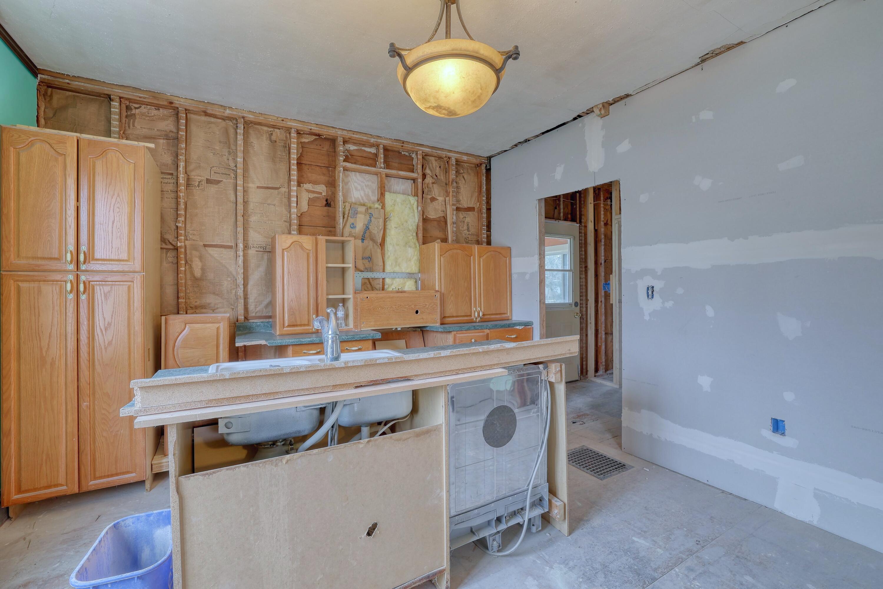 301 Pleasant Street, Unit 303 Mukwonago, WI 53149 - Photo 17 of 24 Lower Kitchen