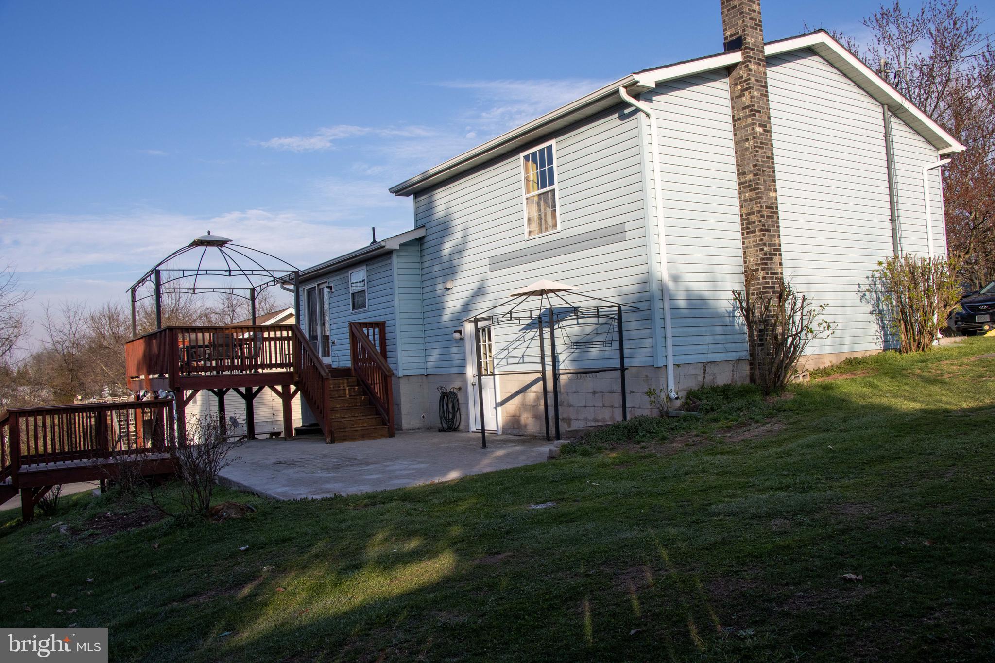 387 West Ridge Loop Road Romney, WV 26757 - Photo 40 of 58 Back of house, concrete patio