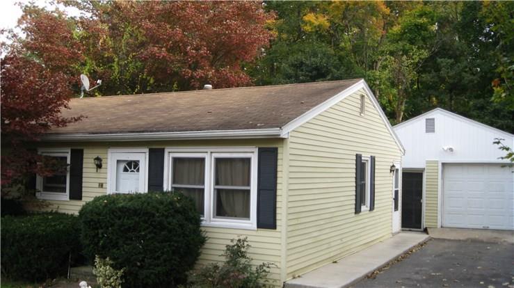 16 Casper Street Danbury, CT 06810 - Photo 1 of 1 a view of a house with a yard