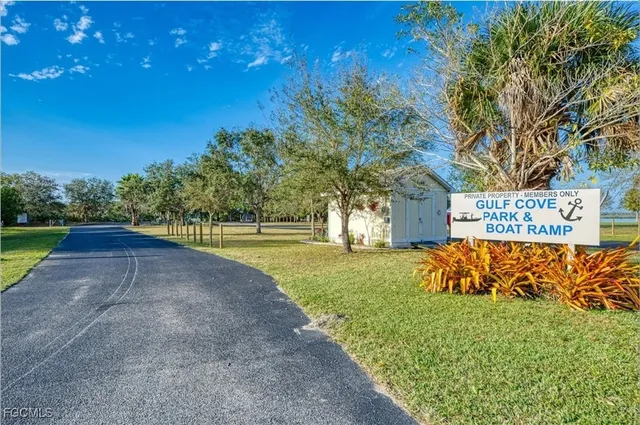 a view of a park with welcome board