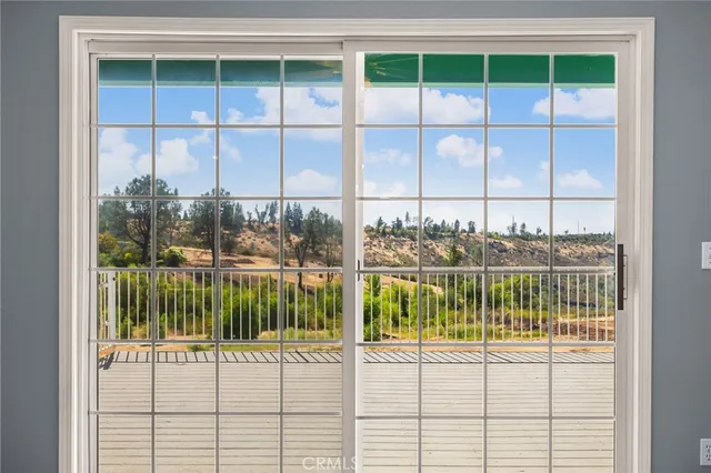 a kitchen with stainless steel appliances granite countertop a sink and a refrigerator