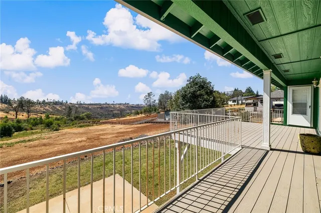 front view of a house with a garden