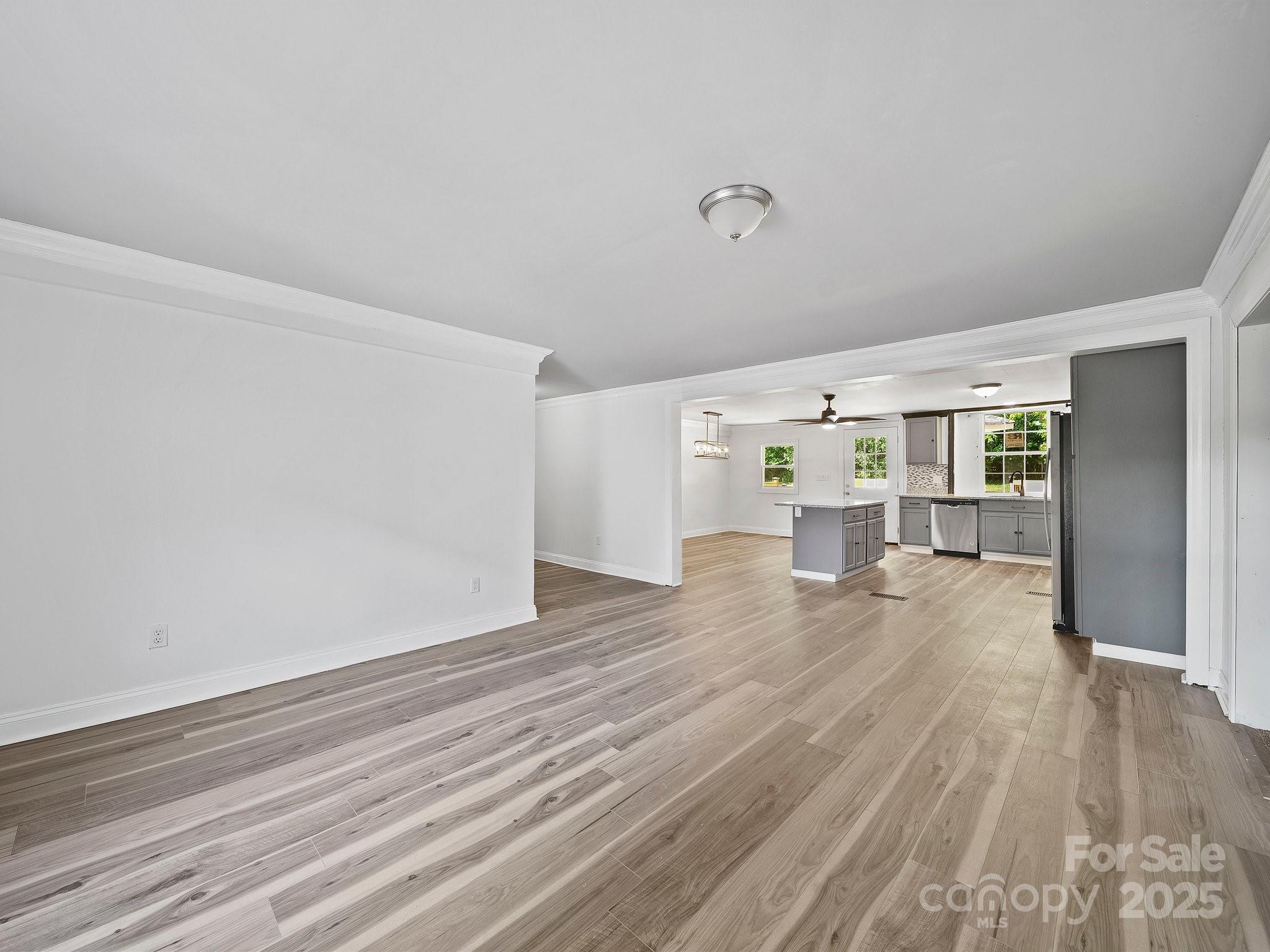 308 Miller Street, Unit 1 Jefferson, SC 29718 - Photo 16 of 44 a view of empty room with wooden floor