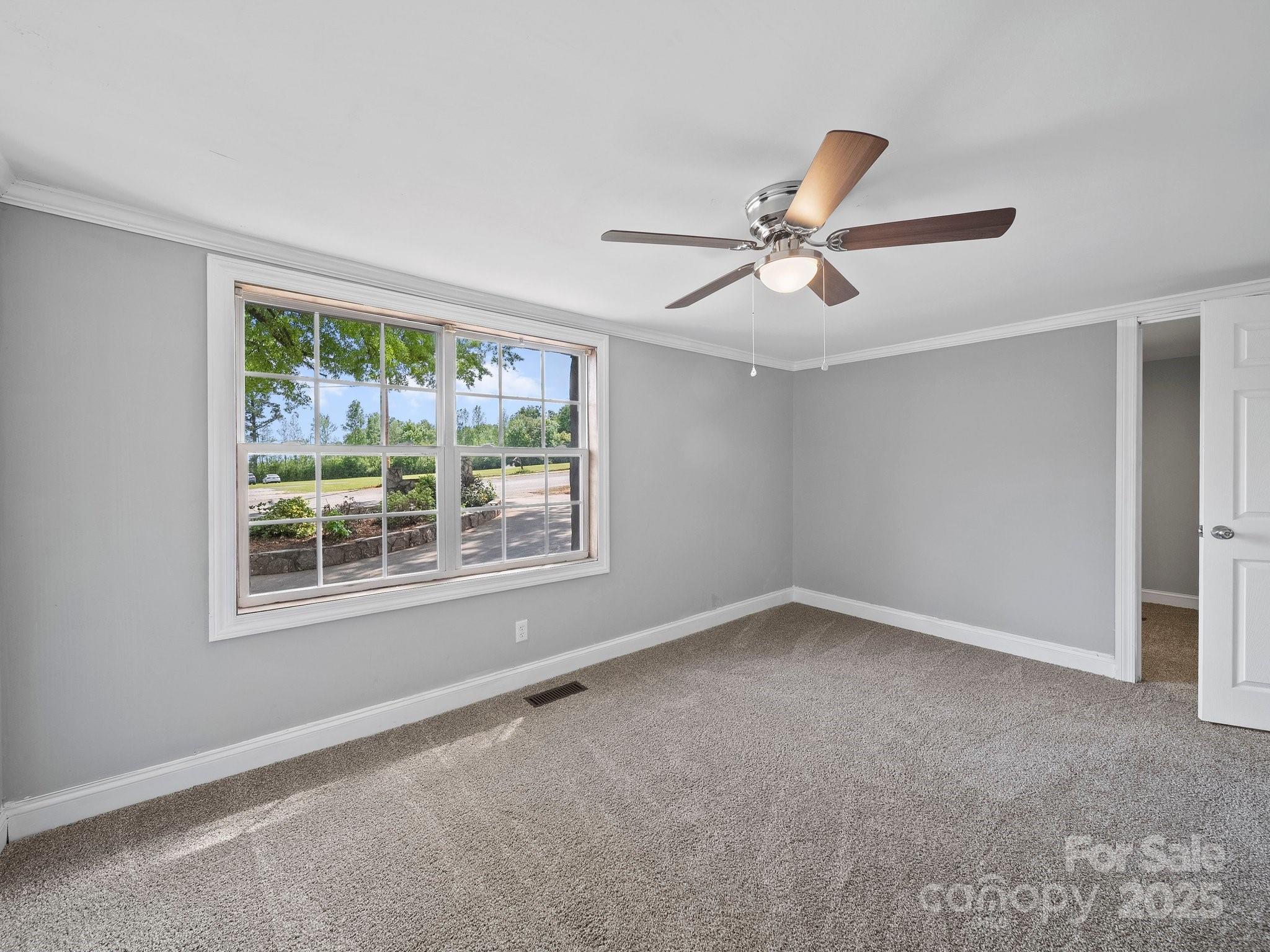 308 Miller Street, Unit 1 Jefferson, SC 29718 - Photo 21 of 44 a view of an empty room with a window