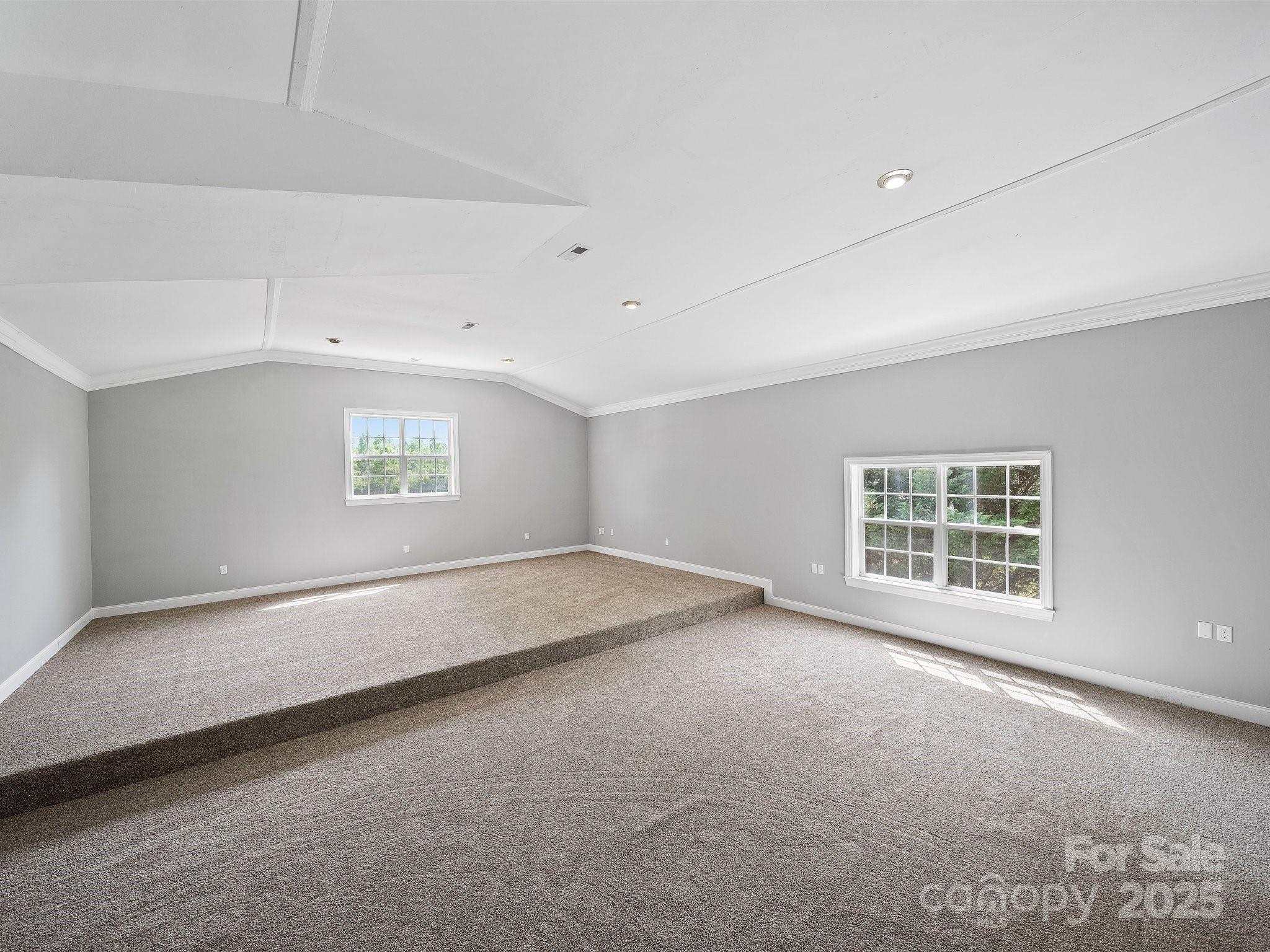 308 Miller Street, Unit 1 Jefferson, SC 29718 - Photo 34 of 44 an empty room with a empty space and windows