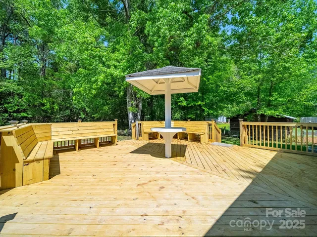 a view of a swimming pool with a lounge chair