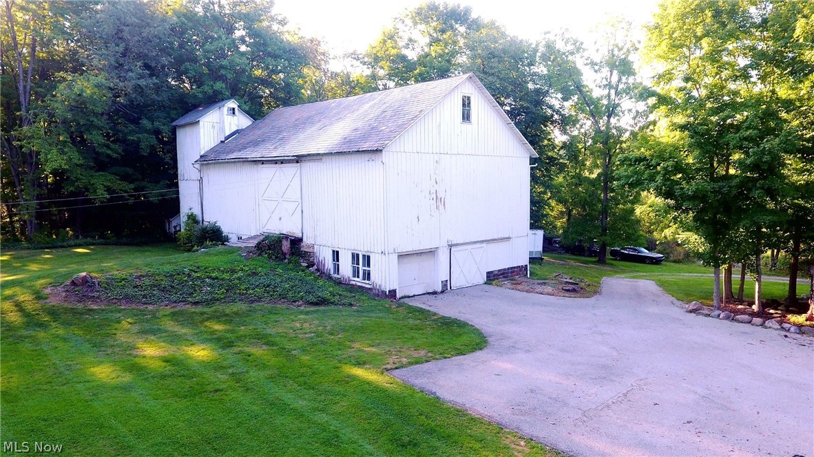 12703 Sheldon Road Mantua, OH 44255 - Photo 6 of 35 Bank barn with lots of storage and original woodwork throughout.