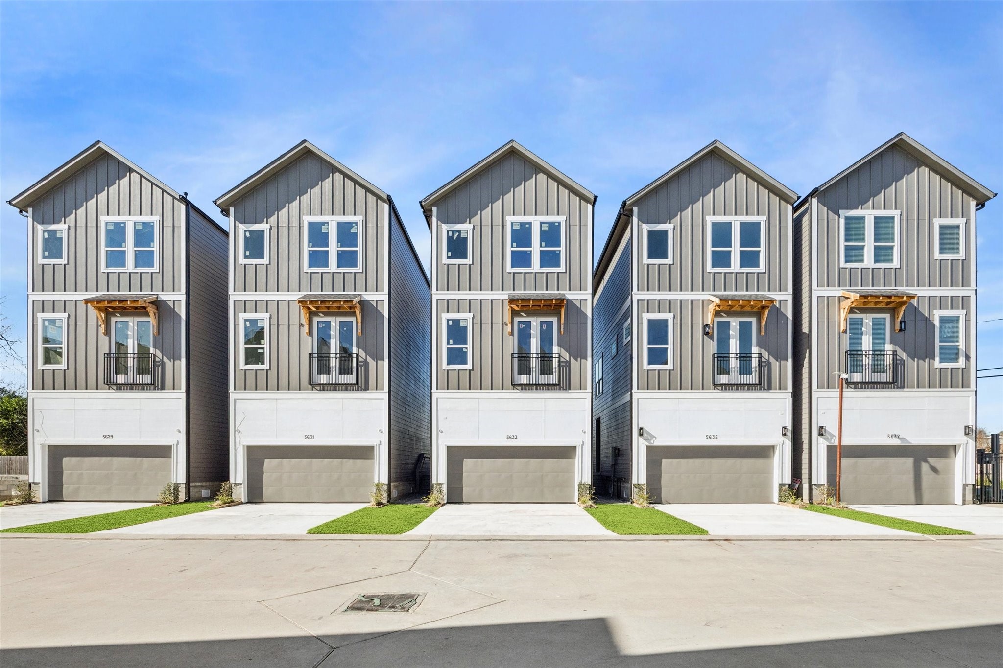 5614 Azores Houston, TX 77091 - Photo 7 of 38 a front view of a house with a yard and garage