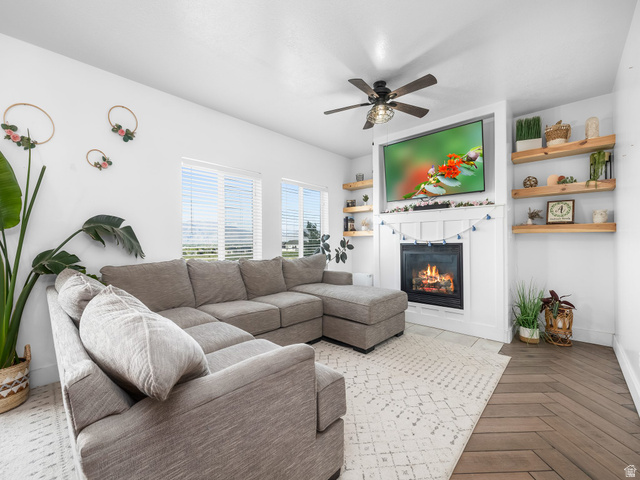 256 West Horizon Loop Payson, UT 84651 - Photo 6 of 33 Living room with parquet floors, ceiling fan, and a glass covered fireplace