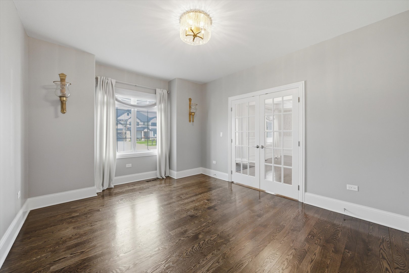 8613 High Stone Way Frankfort, IL 60423 - Photo 12 of 57 wooden floor in an empty room with a window