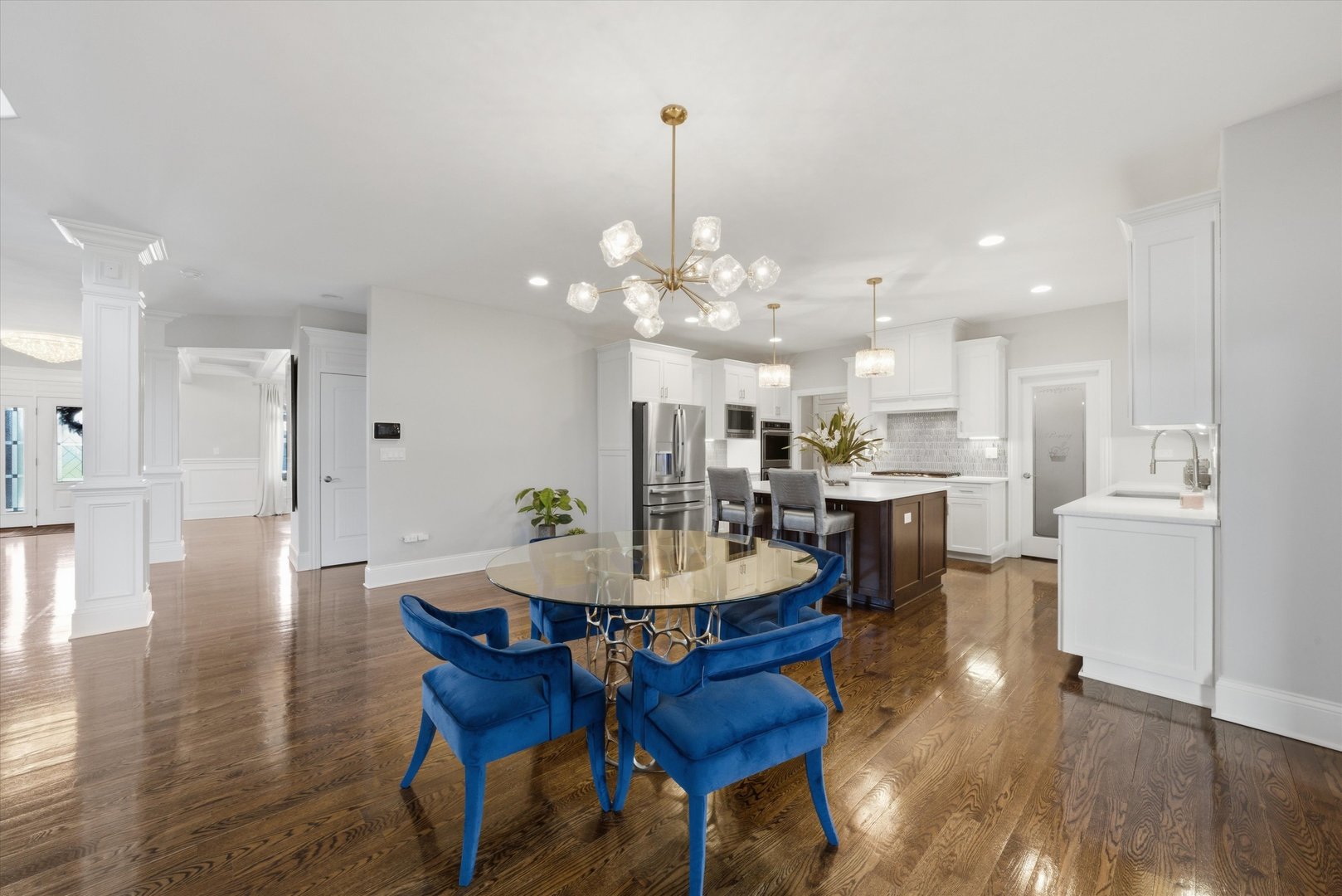 8613 High Stone Way Frankfort, IL 60423 - Photo 14 of 57 a view of a dining room with furniture and wooden floor