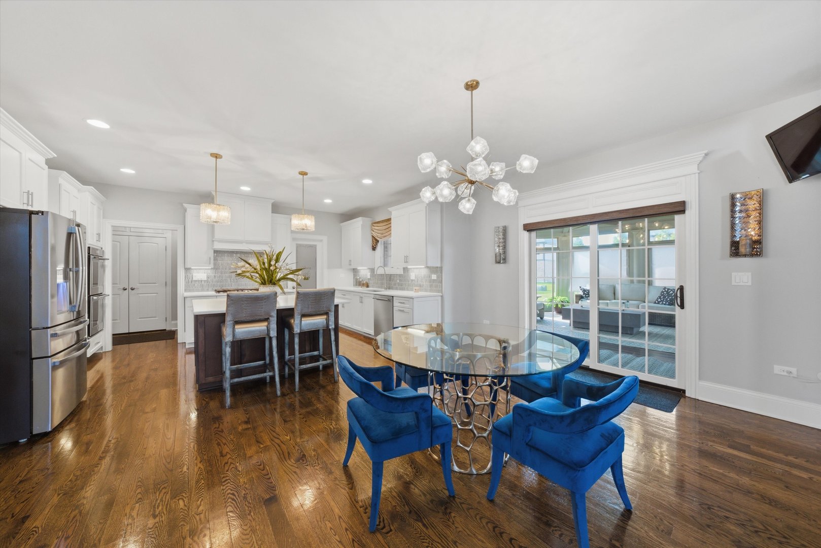 8613 High Stone Way Frankfort, IL 60423 - Photo 15 of 57 a view of a dining room with furniture window and wooden floor