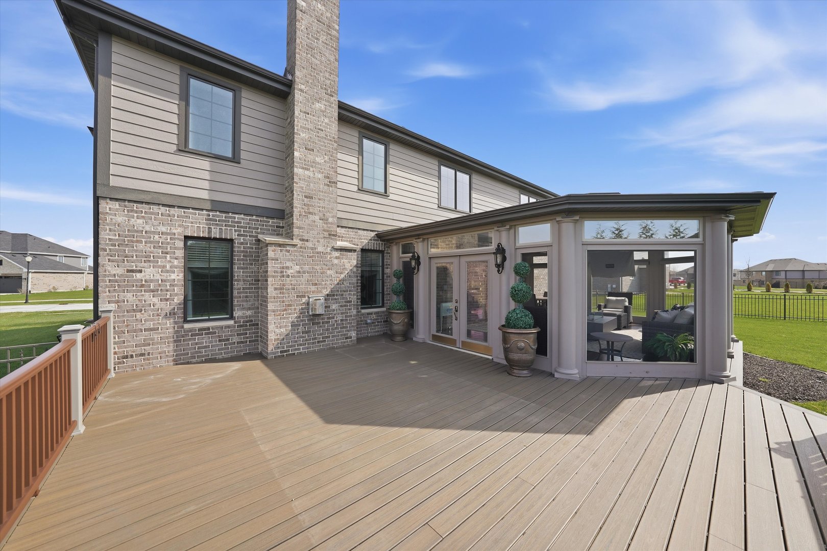 8613 High Stone Way Frankfort, IL 60423 - Photo 47 of 57 a view of a house with a barbeque and wooden floor