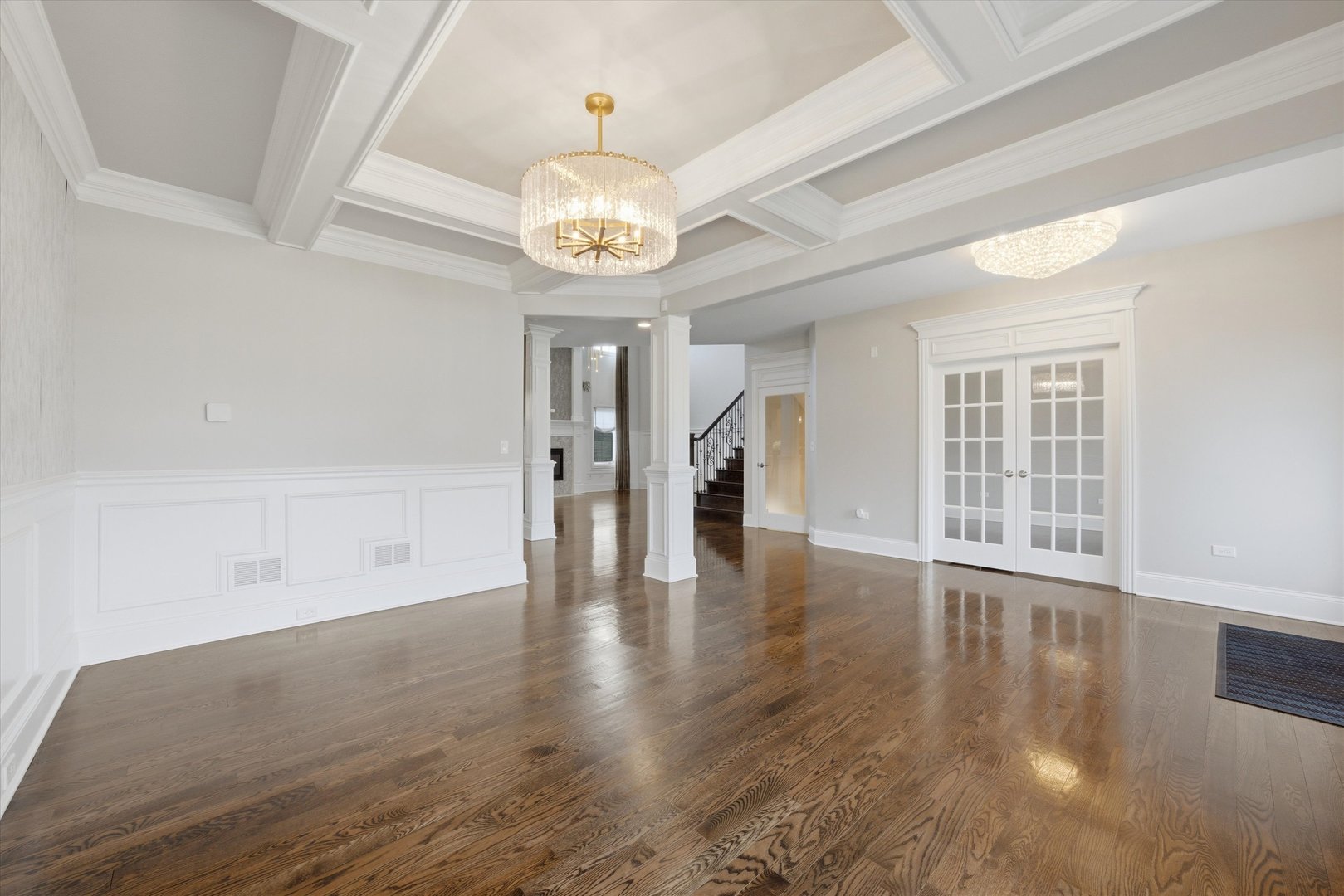 8613 High Stone Way Frankfort, IL 60423 - Photo 6 of 57 a view of an empty room with wooden floor and a window