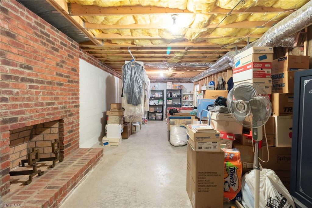 8115 Glengarriff Road Clemmons, NC 27012 - Photo 38 of 47 High ceilings - plumbed - ready for future playroom!