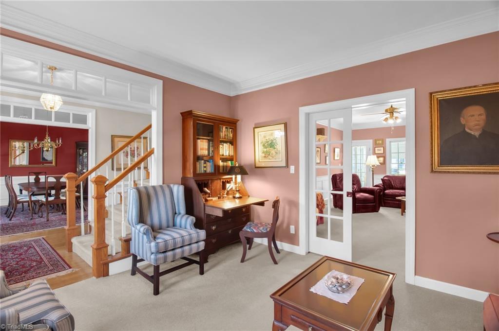 8115 Glengarriff Road Clemmons, NC 27012 - Photo 5 of 47 Pocket doors provides a division from Den