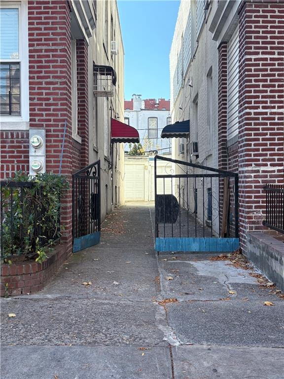 352 68th Street Brooklyn, NY 11220 - Photo 4 of 14 a view of a brick house with many windows