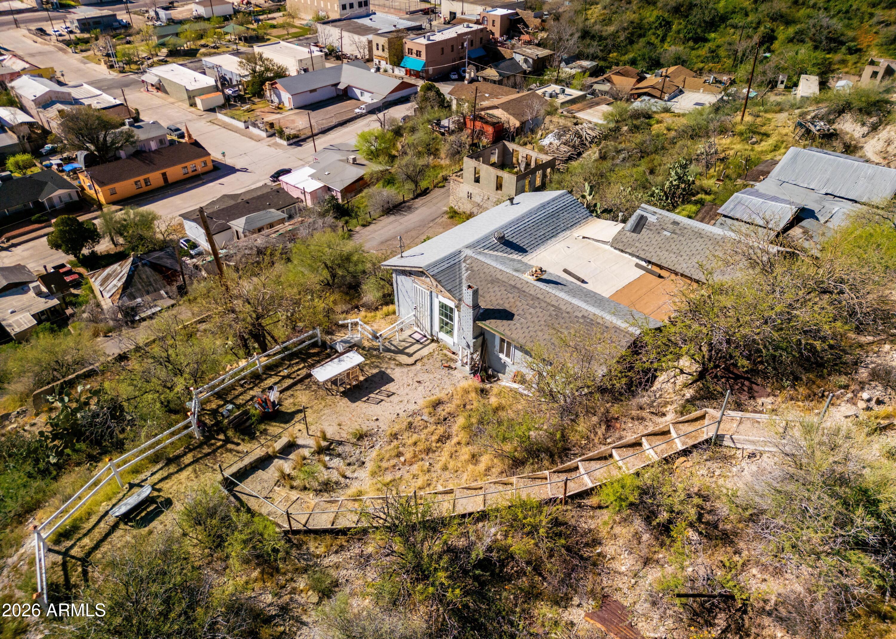 512 West Pinto Street Miami, AZ 85539 - Photo 11 of 27 an aerial view of residential houses with outdoor space