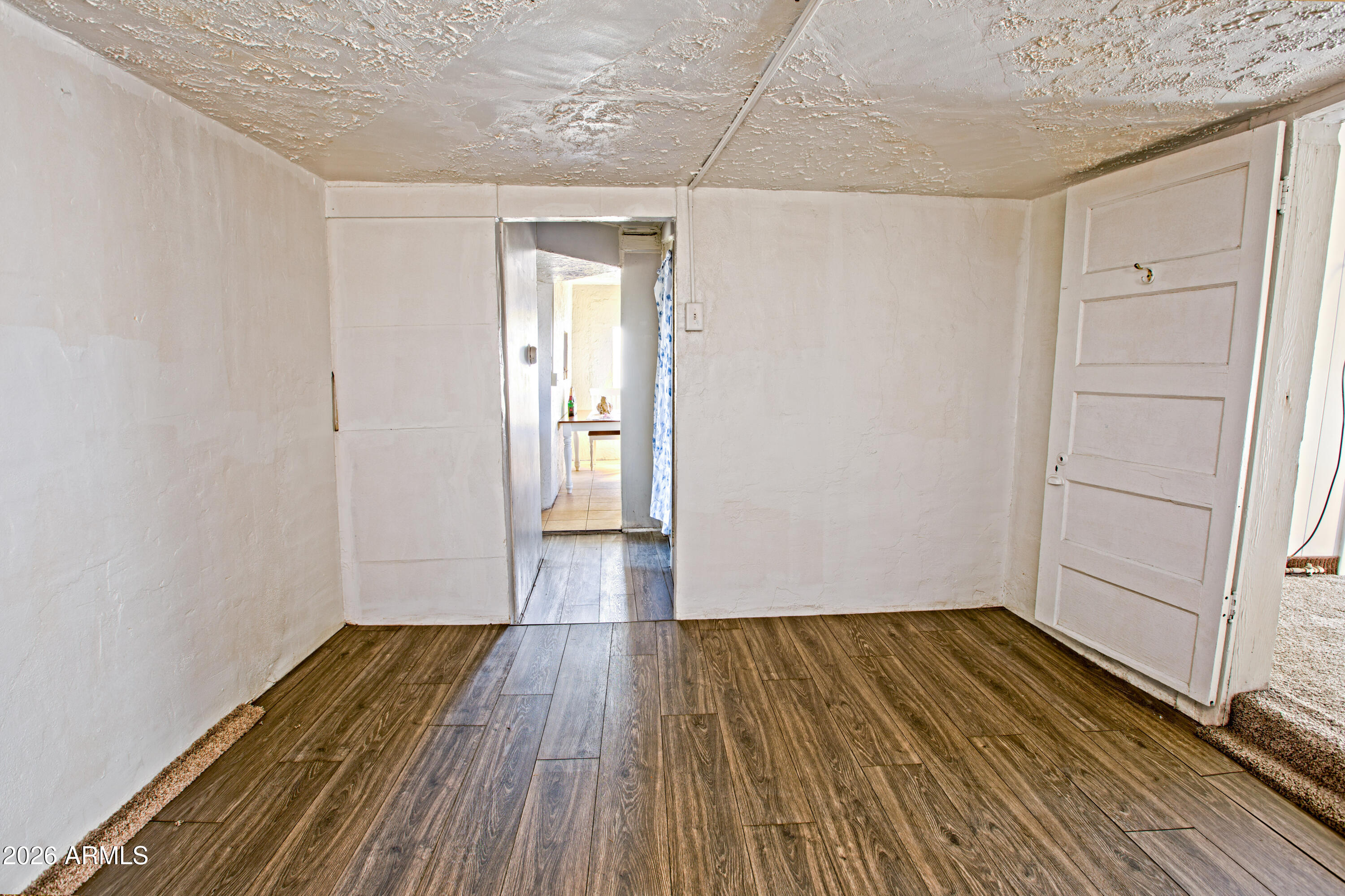 512 West Pinto Street Miami, AZ 85539 - Photo 27 of 27 a view of a room with wooden floor