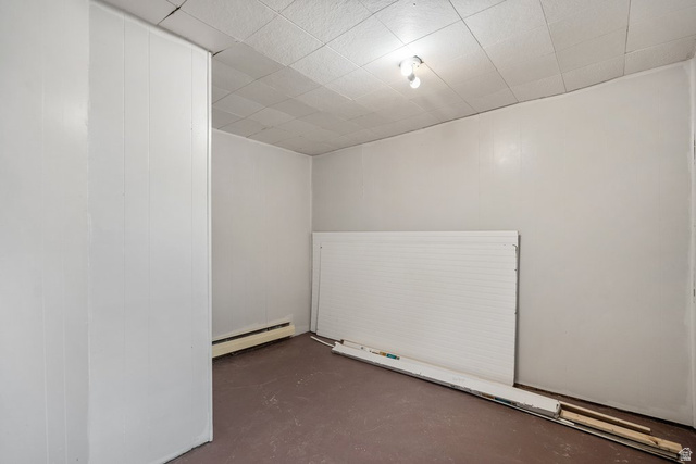 149 West 1600th Street South Mapleton, UT 84664 - Photo 35 of 44 Spare room featuring finished concrete flooring and a baseboard heating unit