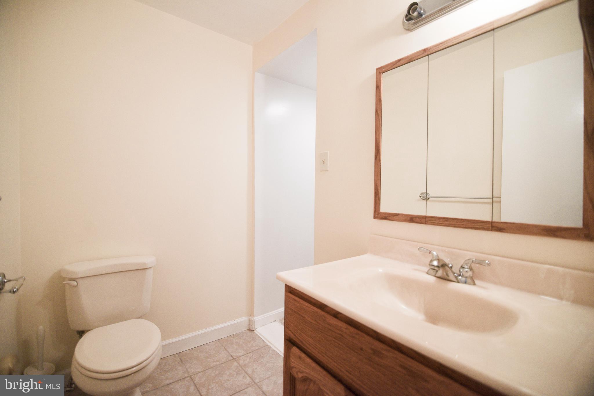 4533 Green Valley Road Monrovia, MD 21770 - Photo 14 of 27 Down stairs full bath