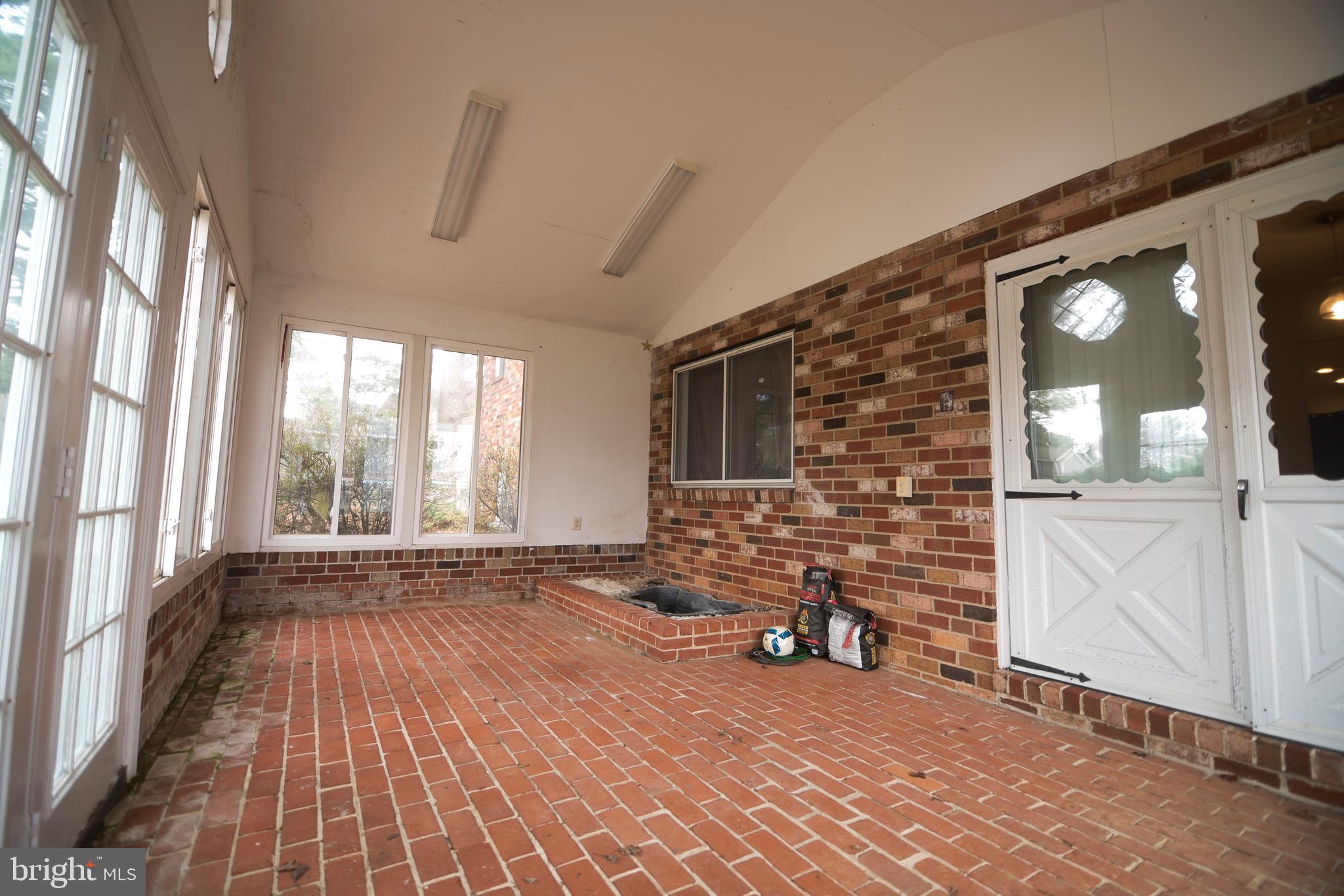 4533 Green Valley Road Monrovia, MD 21770 - Photo 27 of 27 Back of house Sunroom, water feature,.
