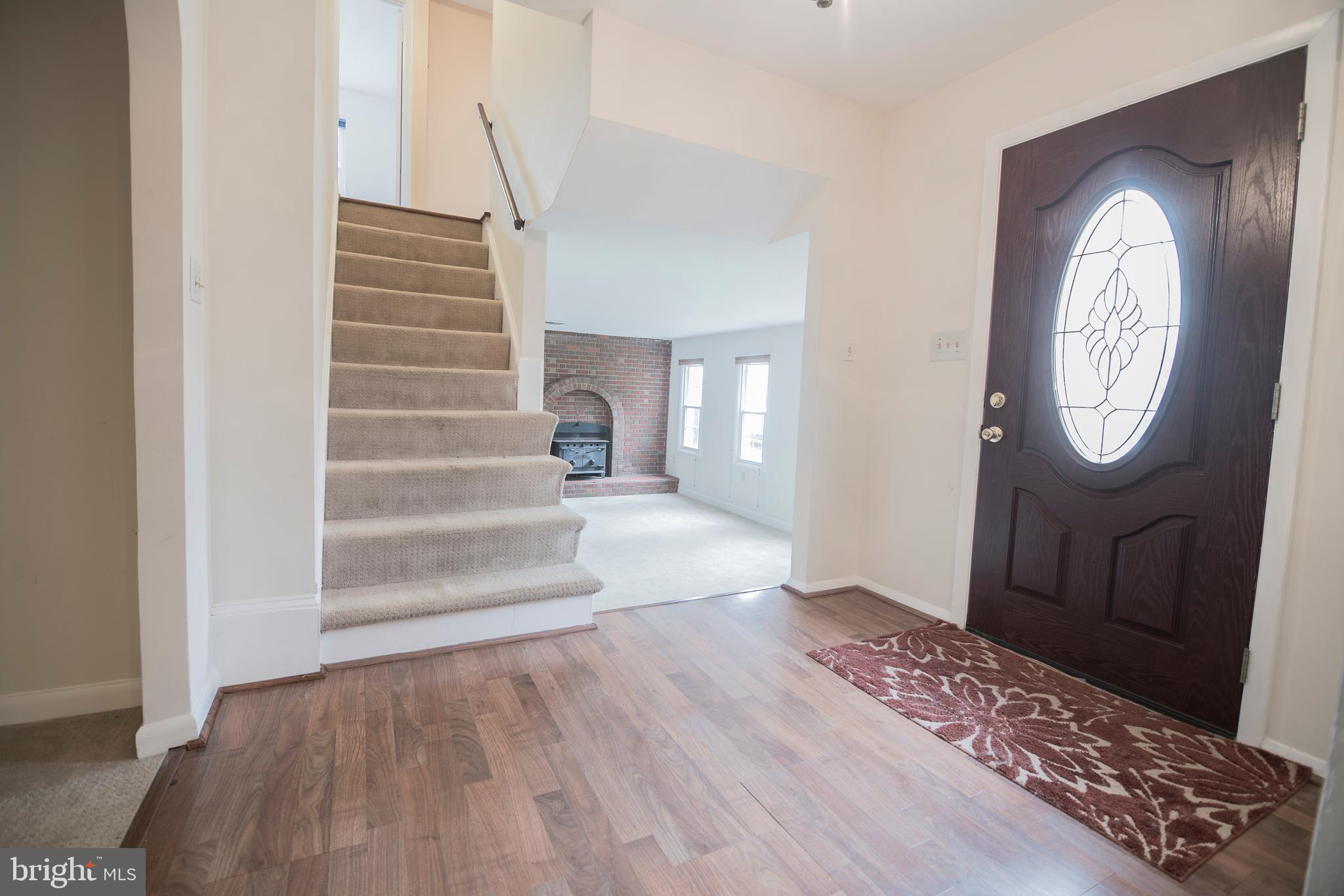 4533 Green Valley Road Monrovia, MD 21770 - Photo 8 of 27 Front entry way looking at down stairs living are