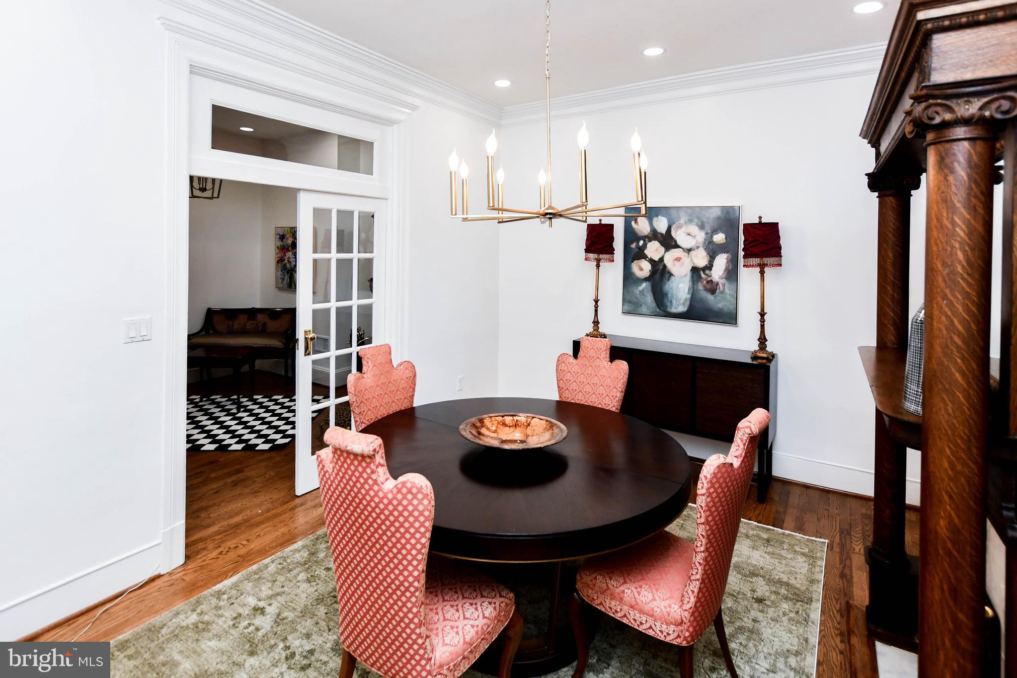34 R Street Northeast Washington, DC 20002 - Photo 14 of 74 a dining room with furniture and wooden floor