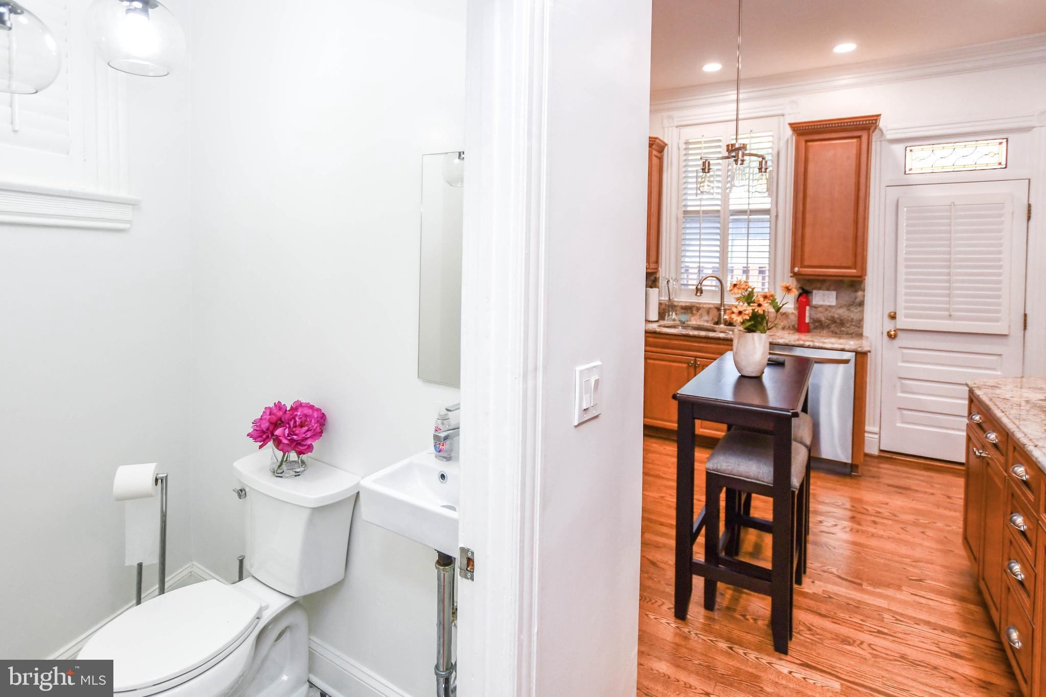 34 R Street Northeast Washington, DC 20002 - Photo 17 of 74 a bathroom with a sink vanity and toilet