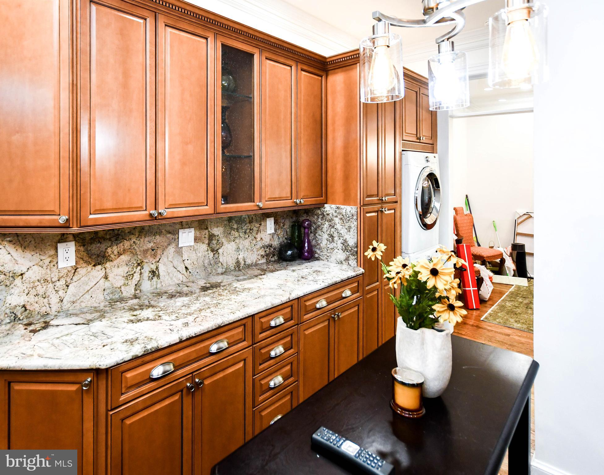 34 R Street Northeast Washington, DC 20002 - Photo 25 of 74 a kitchen with a sink and cabinets