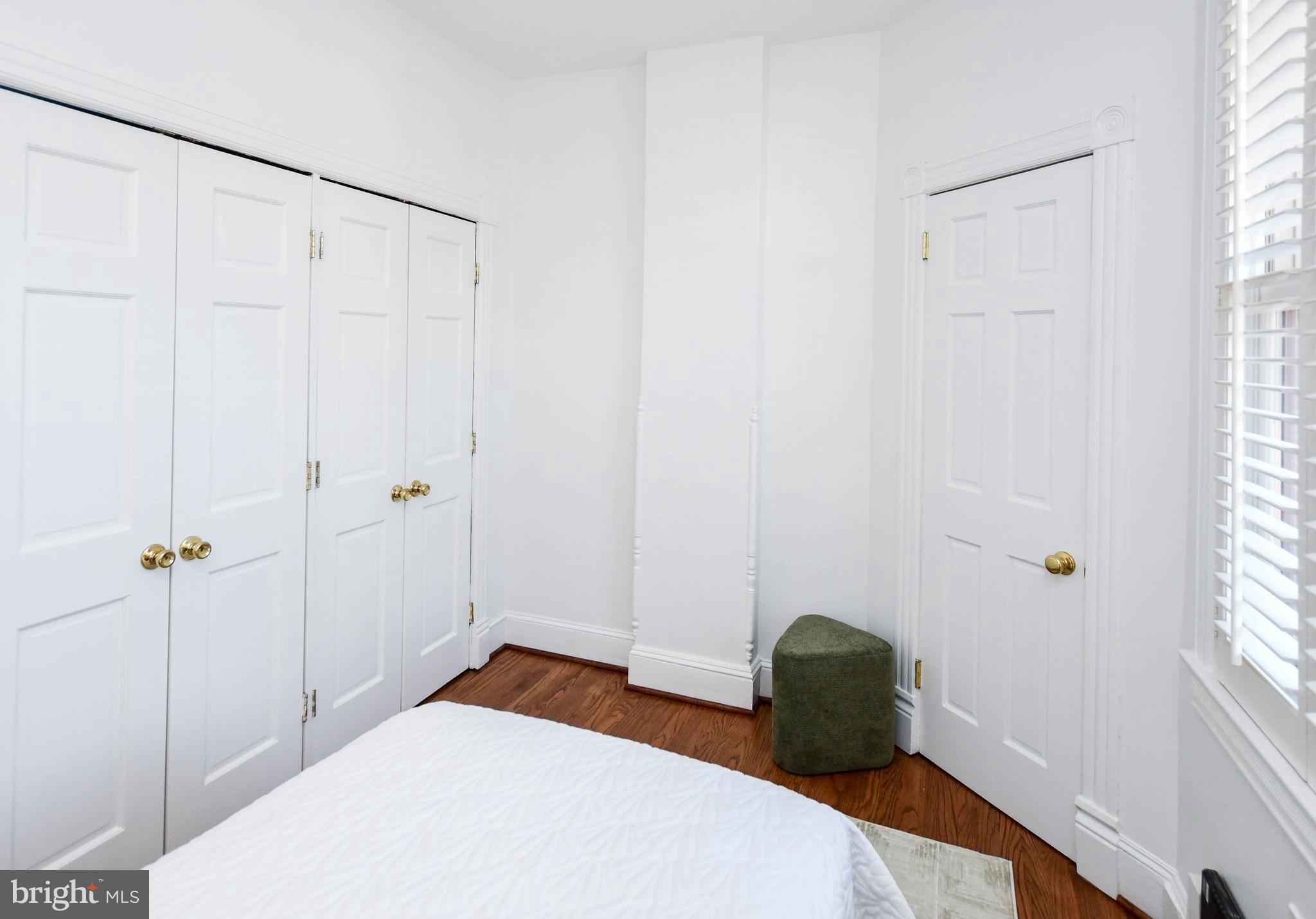 34 R Street Northeast Washington, DC 20002 - Photo 32 of 74 a bedroom with a bed and a window