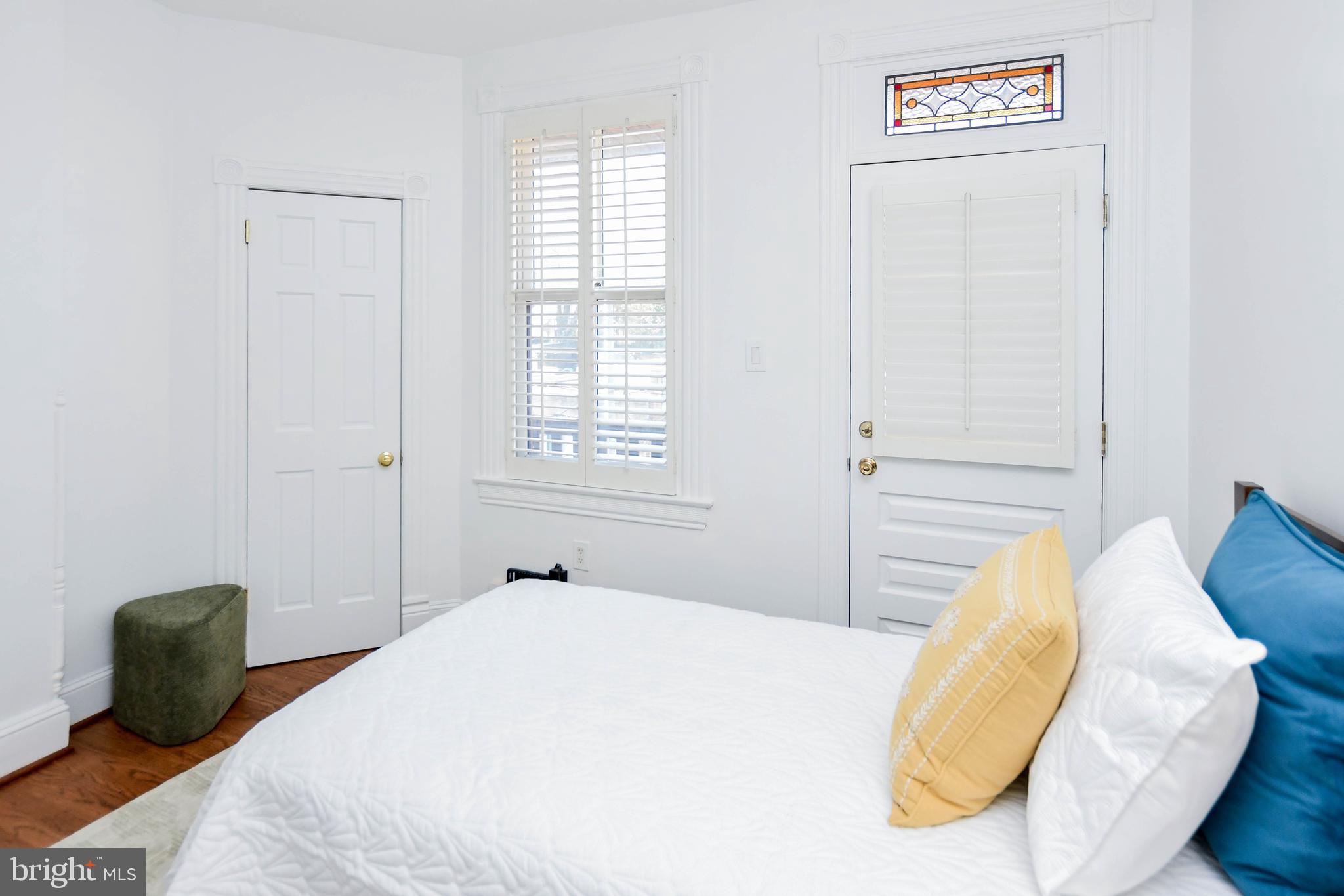 34 R Street Northeast Washington, DC 20002 - Photo 33 of 74 a bedroom with a bed and a window