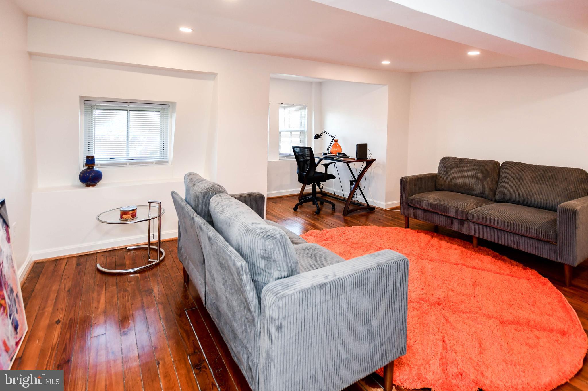 34 R Street Northeast Washington, DC 20002 - Photo 44 of 74 a living room with furniture and a wooden floor
