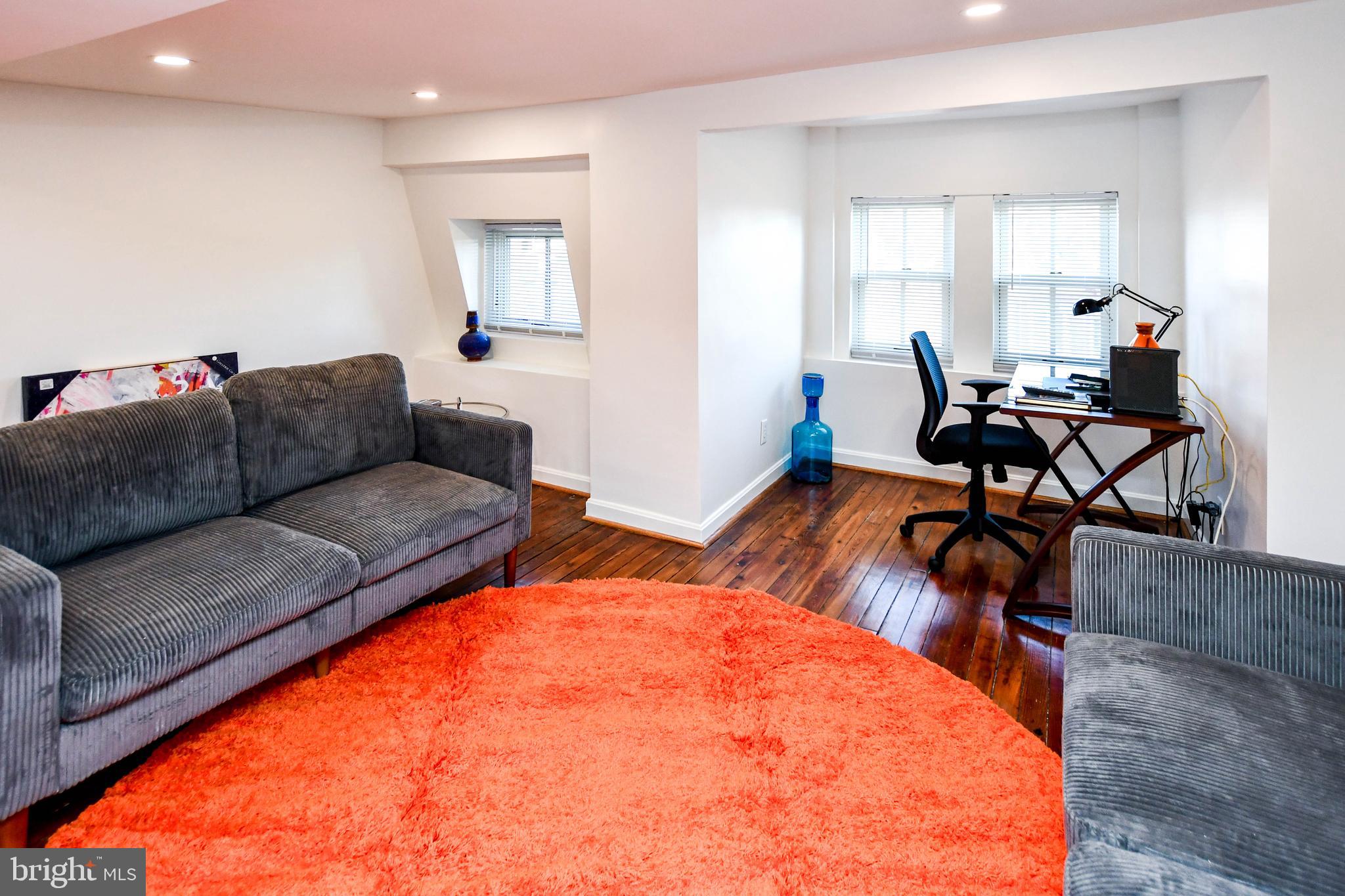 34 R Street Northeast Washington, DC 20002 - Photo 47 of 74 a living room with furniture and a wooden floor