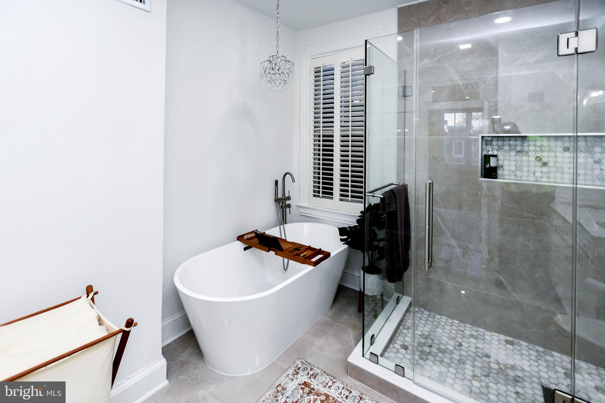 34 R Street Northeast Washington, DC 20002 - Photo 55 of 74 a bathroom with a sink and bathtub with shower