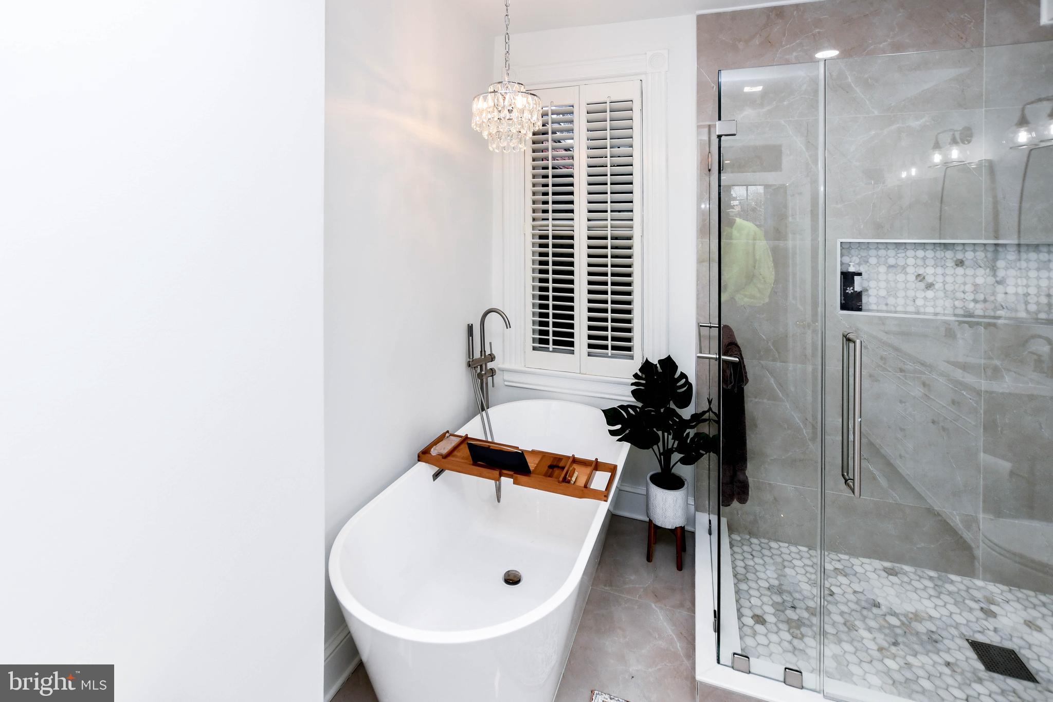 34 R Street Northeast Washington, DC 20002 - Photo 59 of 74 a bathroom with a bathtub and a shower